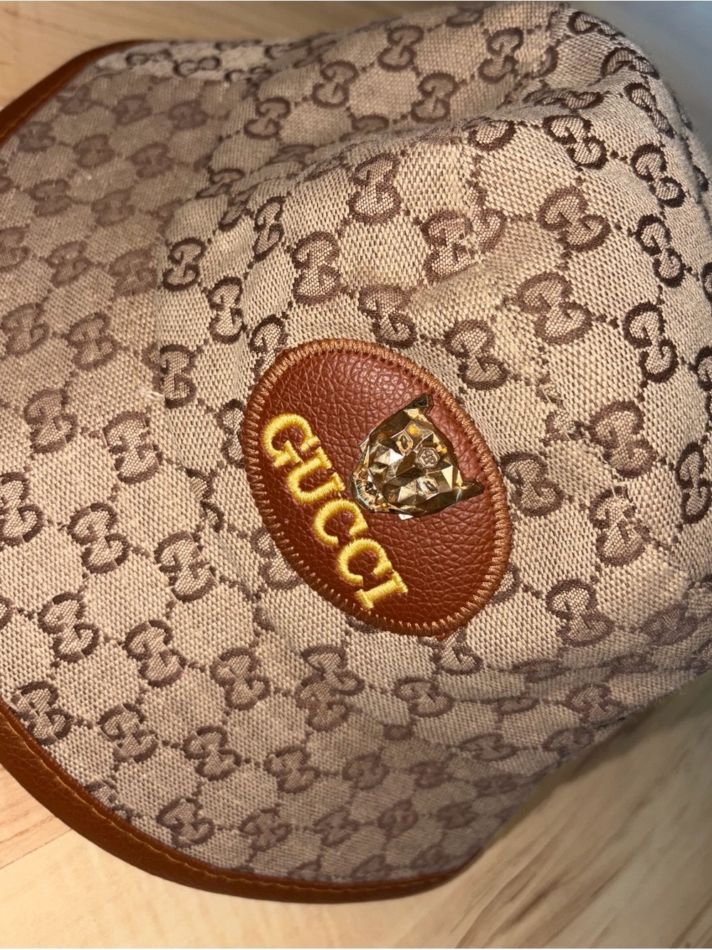 Gucci Beige/Tan Monogram Bucket Hat with Gold Logo Patch